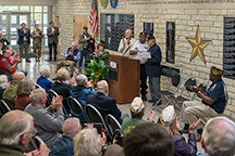 American Legion presenting donation check during dedication.
